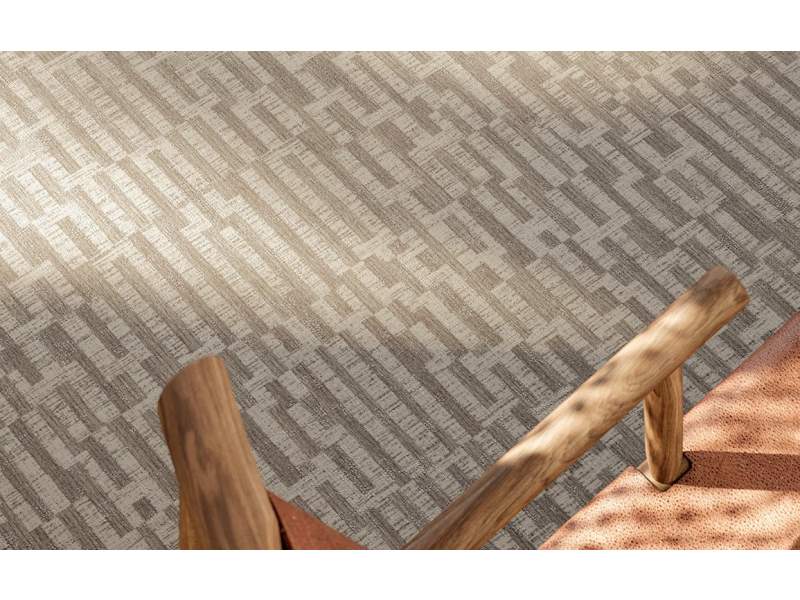 Object Carpet Bricks Teppichboden in einem Wohnbereich mit kleinteiligem, geometrischem Muster