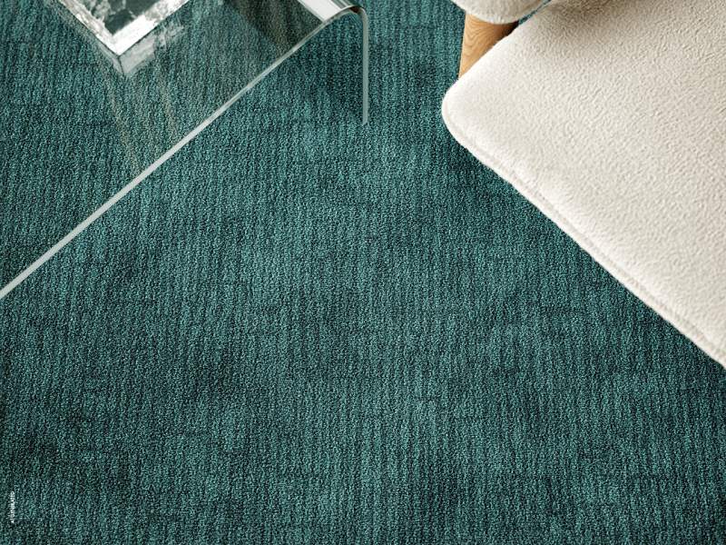 Object Carpet Slate Teppichboden in einer Lounge mit dezent linear strukturierter Oberfläche