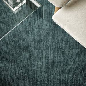 Object Carpet Slate Teppichboden in einer Lounge mit dezent linear strukturierter Oberfläche