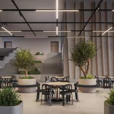 XAL Move it pro Lichtsystem im Einsatz in einem Gastronomiebereich mit linearen Lichtstrukturen an der Decke