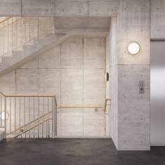 Einsatz der REGENT Lunigo Wand- und Deckenleuchten im Treppenhaus – robuste Architekturbeleuchtung.