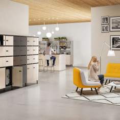 Modulares Lockersystem in Kombination mit Lounge-Bereich zur Zonierung von Büroflächen