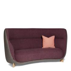 Materia Arch Sofa mit organischer Form und dekorativem Kissen für moderne Loungebereiche