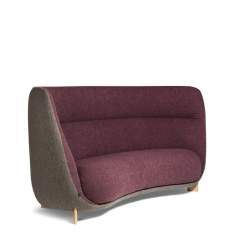 Materia Arch Sofa mit geschwungener Rückenlehne und seitlichen Armflächen in Seitenansicht