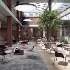 Brunner crona light lounge Loungesessel im Einsatz im offenen Atrium mit Café- und Loungebereich sowie unterschiedlichen Sitzgruppen