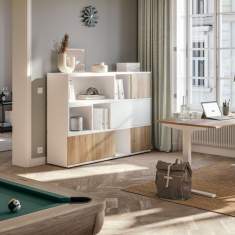Assmann Büromöbel Consento Triest Highback Loungesessel im Homeoffice neben dem Arbeitsplatz