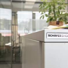 Schäfer Shop AG Stauraumlösung im Bürobereich der Concordance SA