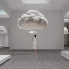 Object Carpet MATRIX Teppichboden in einer minimalistischen Rauminszenierung mit skulpturalen Wolkenelementen