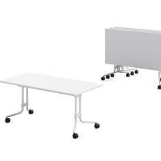 König + Neurath MEMO.S mit ausgeklapptem Tisch und platzsparend zusammengestellten Tischen mit hochgeklappten Tischplatten